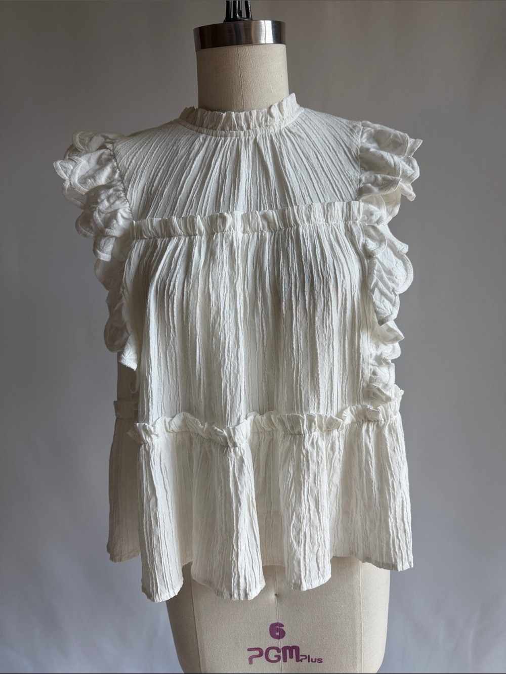 Textured Ruffle Sleeveless Blouse in White